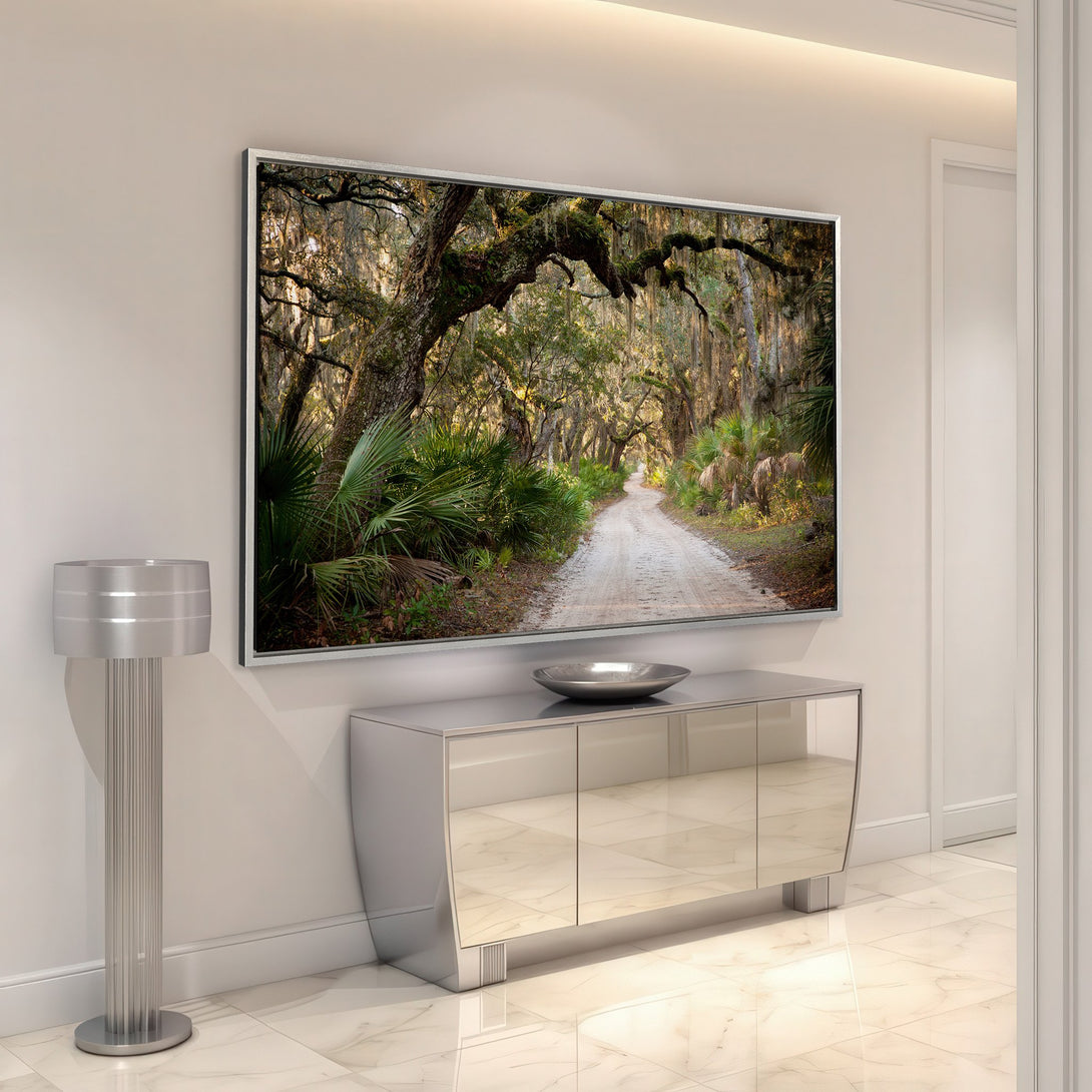 Framed Wall Art: Scenic road through trees. Earthy tones of green, brown, and beige. Bring nature's beauty into your home with this stunning canvas print.
