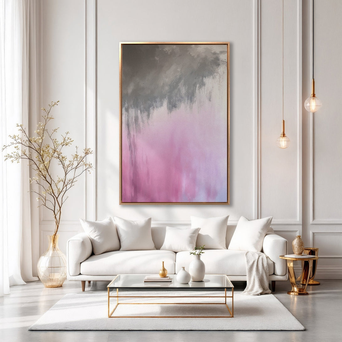 Framed Wall Art: Abstract pink & gray canvas print in a modern living room. Elevate your space with this stylish, minimalist art piece. Shop now!