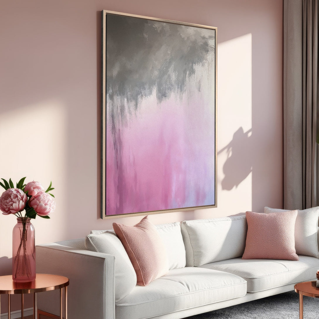 Framed Wall Art: Abstract pink and gray canvas print in a modern living room. Soft, feminine color palette perfect for home decor.