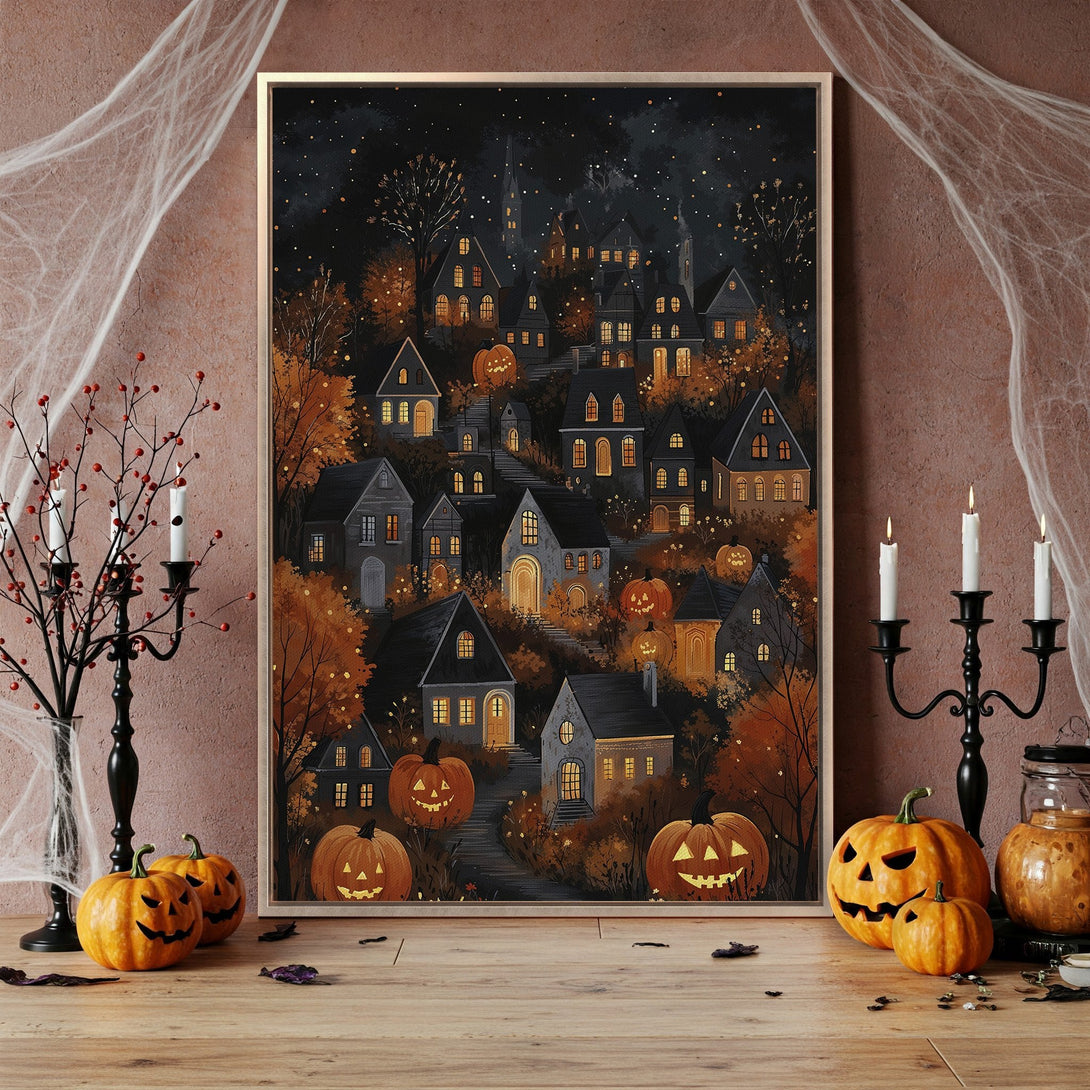 Framed Wall Art featuring a spooky Halloween village scene in a warm, autumnal color palette. Perfect for adding a touch of eerie charm to your home decor.