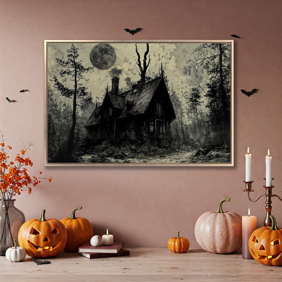 Framed Wall Art of spooky house in a forest, perfect for Halloween decor. Black and white art with a touch of gold.