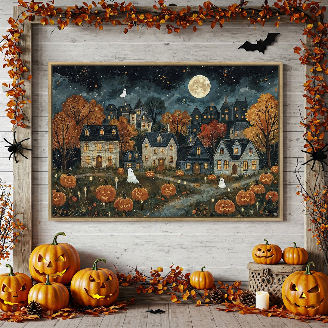 Framed Wall Art: Spooky Halloween village scene in warm orange, blue, and yellow tones. Perfect fall decor for your home.
