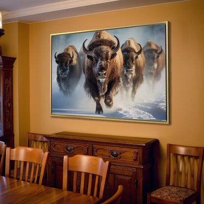 Herd of Buffalo Running Through Snowy Field Canvas Print