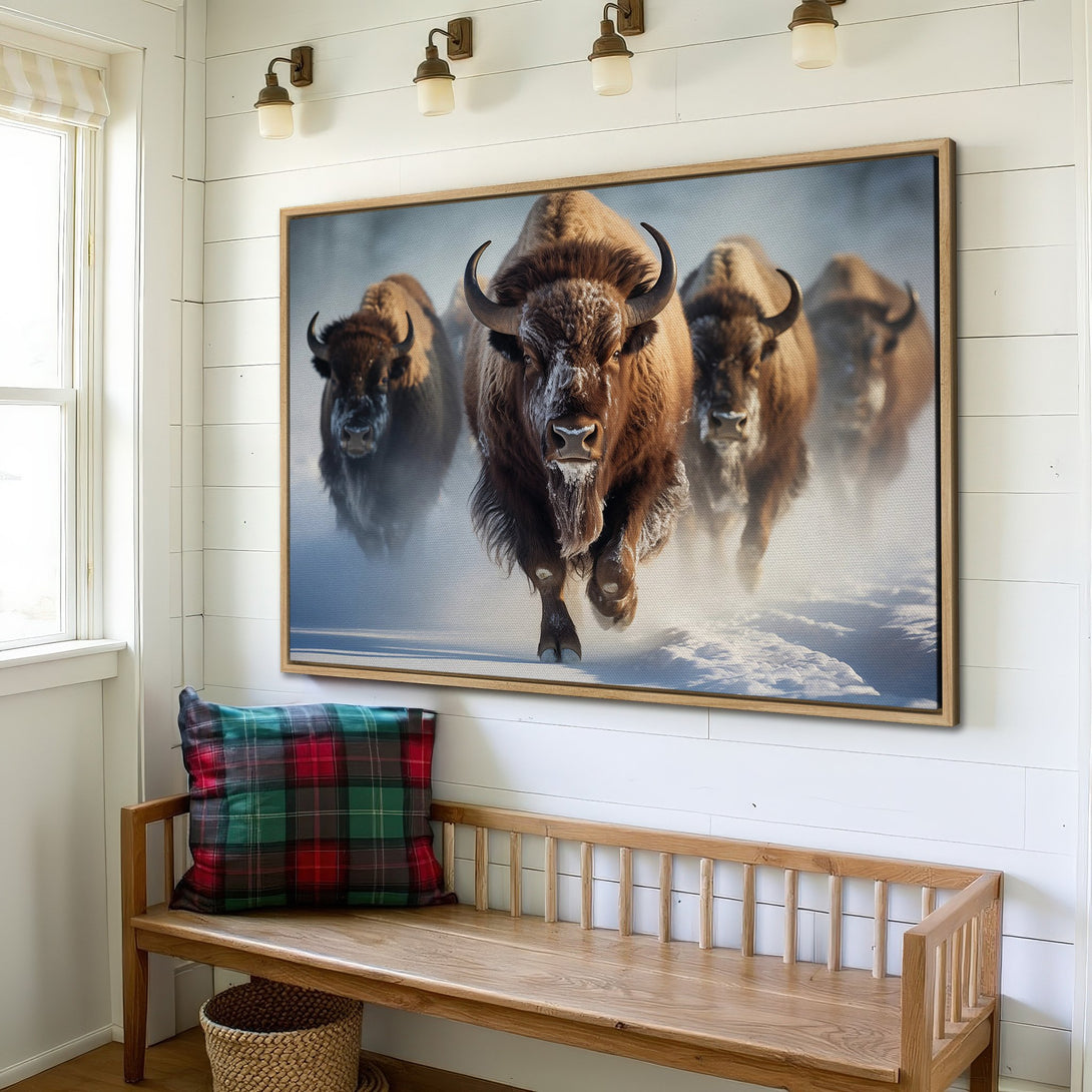 Framed Wall Art featuring charging bison in a snowy landscape. Rustic style with brown and blue tones. Perfect for adding a touch of nature to your decor.