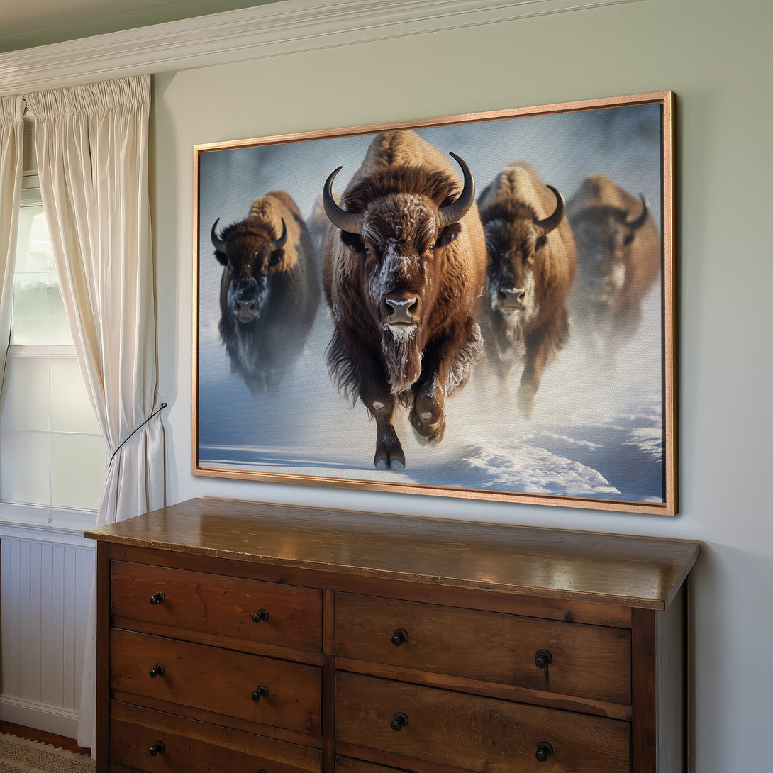 Framed Wall Art featuring bison in winter. Rustic style with warm brown and cool blue tones. Perfect for adding a touch of nature to your space.