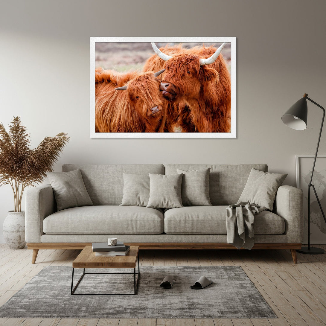Framed Poster featuring two Highland cows in a warm, neutral color palette. Perfect for adding a touch of rustic charm to your home decor.
