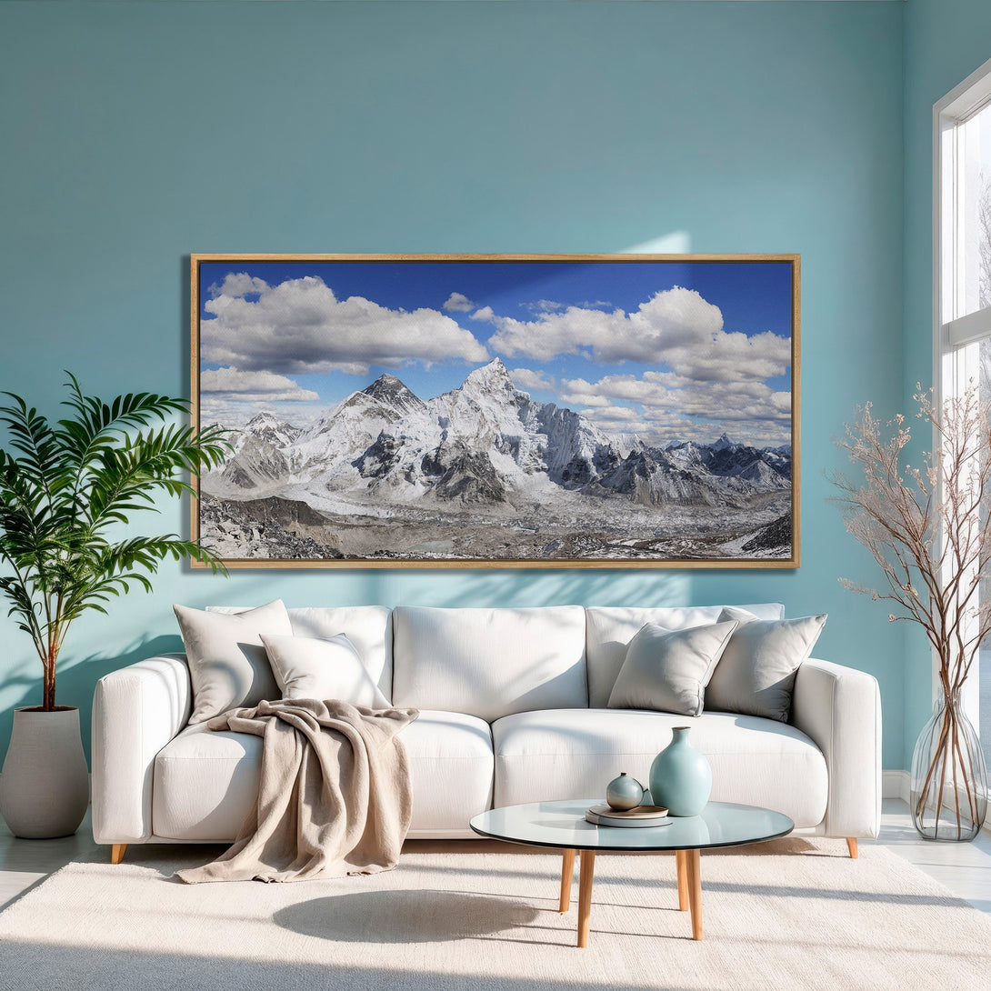 Framed Wall Art of majestic mountain landscape in a modern interior. Featuring a cool blue and white color palette, perfect for a serene living space.