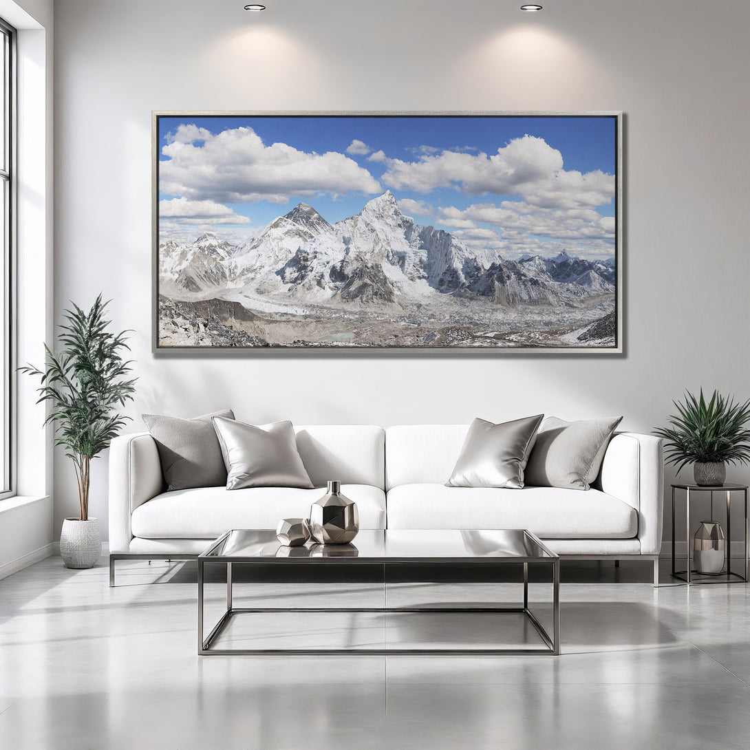 Framed Wall Art: Stunning mountain landscape Canvas Print in a modern living room. Featuring a blue, white, and gray color palette. Perfect home decor!