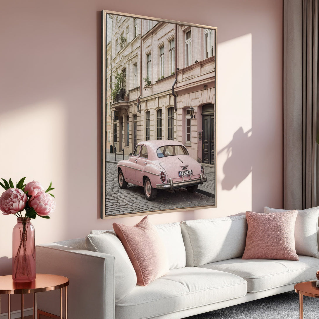 Framed Wall Art: Vintage pink car on cobblestone street. Soft, romantic color palette of pinks and neutrals. Perfect for adding a touch of elegance.