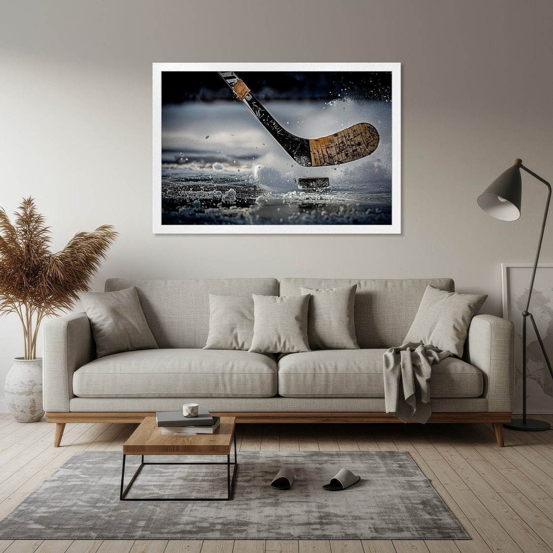 Framed Poster of hockey stick hitting puck. Dramatic action shot in a neutral, cool color palette. Perfect wall art for sports fans.