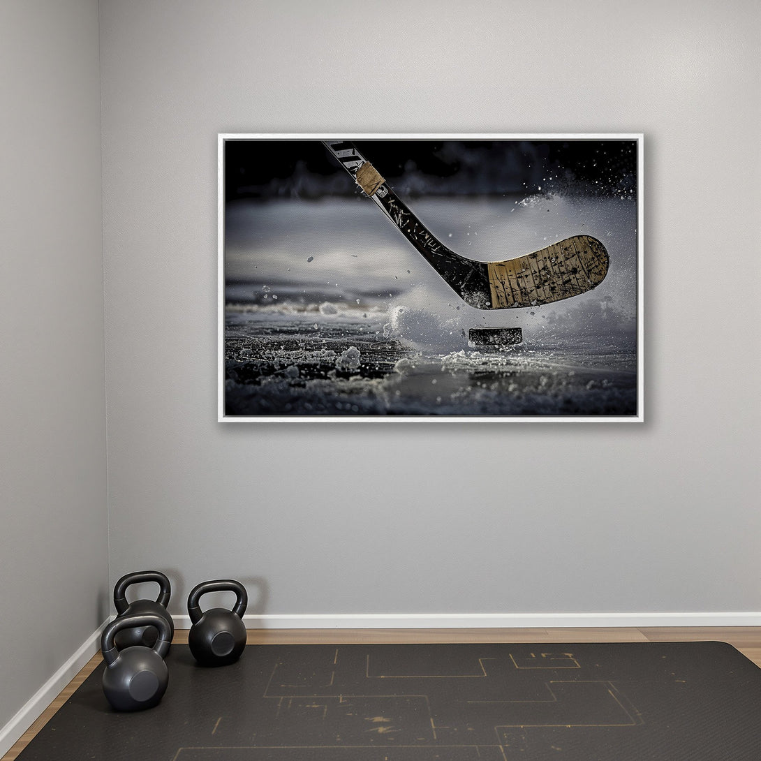 Framed Wall Art: Dynamic hockey action print in grayscale. Captures a hockey stick hitting the puck. Modern sports decor with a neutral color palette.