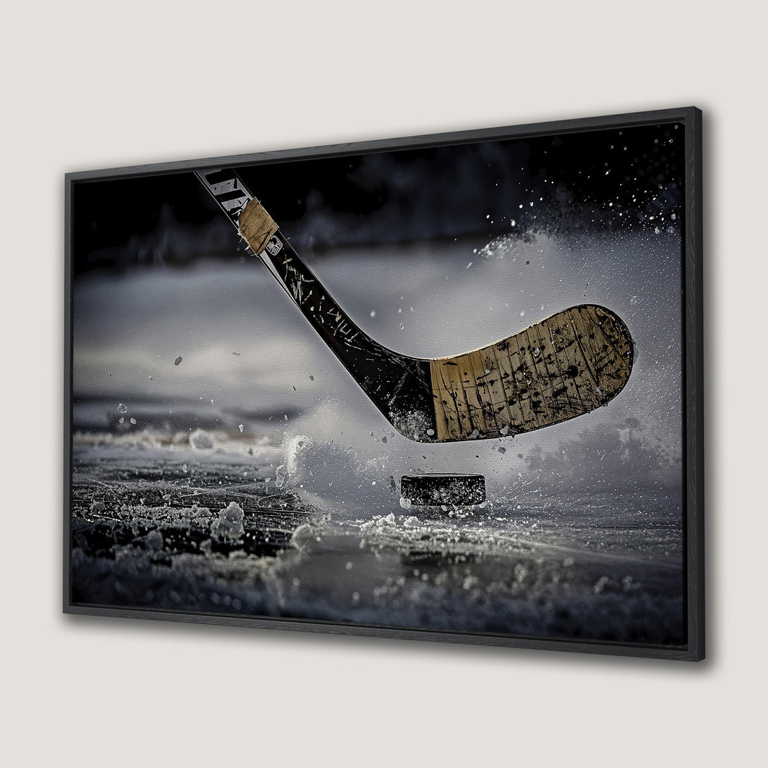 Framed Wall Art: Dynamic hockey action canvas print. Black and white image of a hockey stick hitting a puck, capturing the energy of the game. Perfect sports decor.