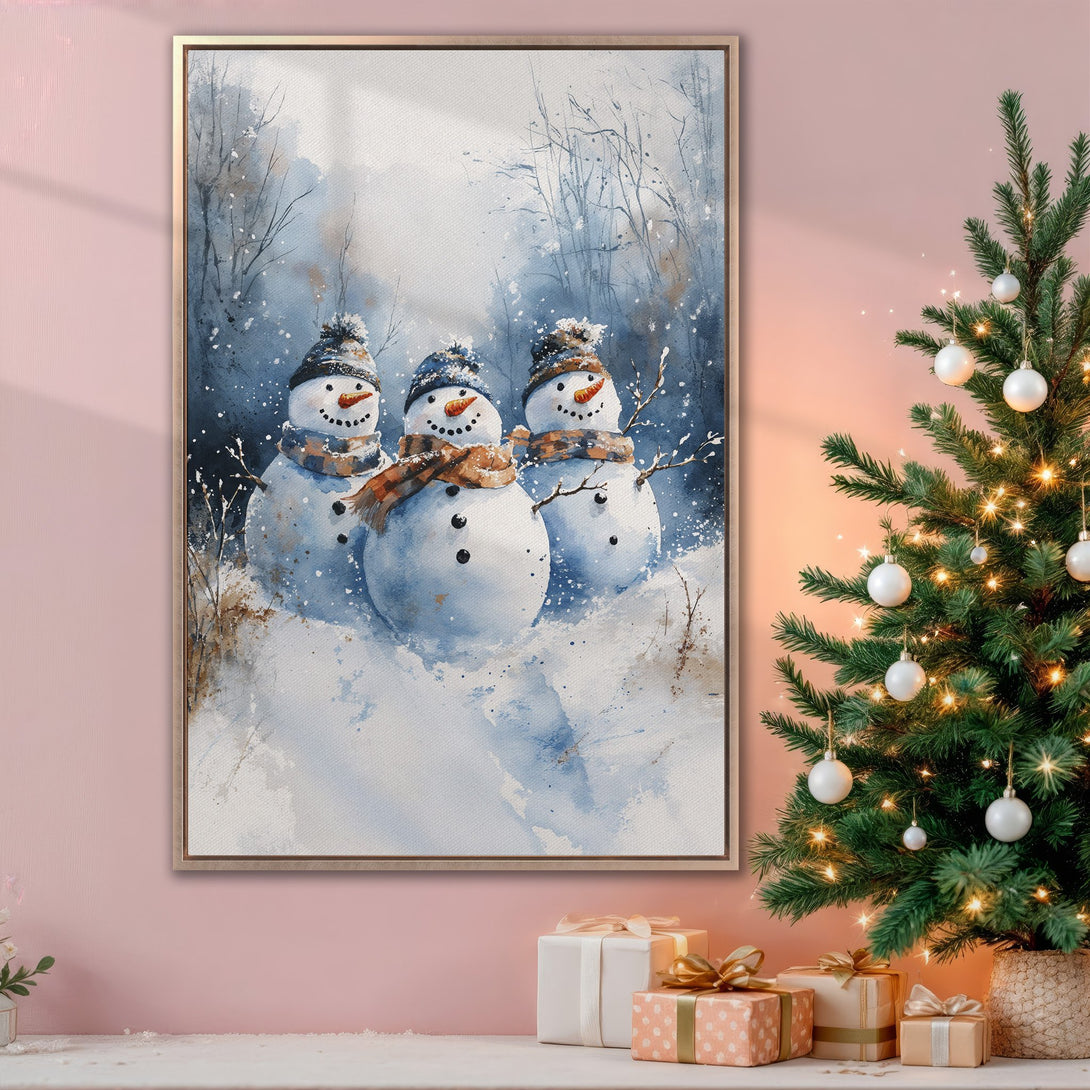 Framed Wall Art featuring watercolor snowmen in a winter scene. Blue and white color palette, perfect for Christmas decor. Add festive charm to your home!