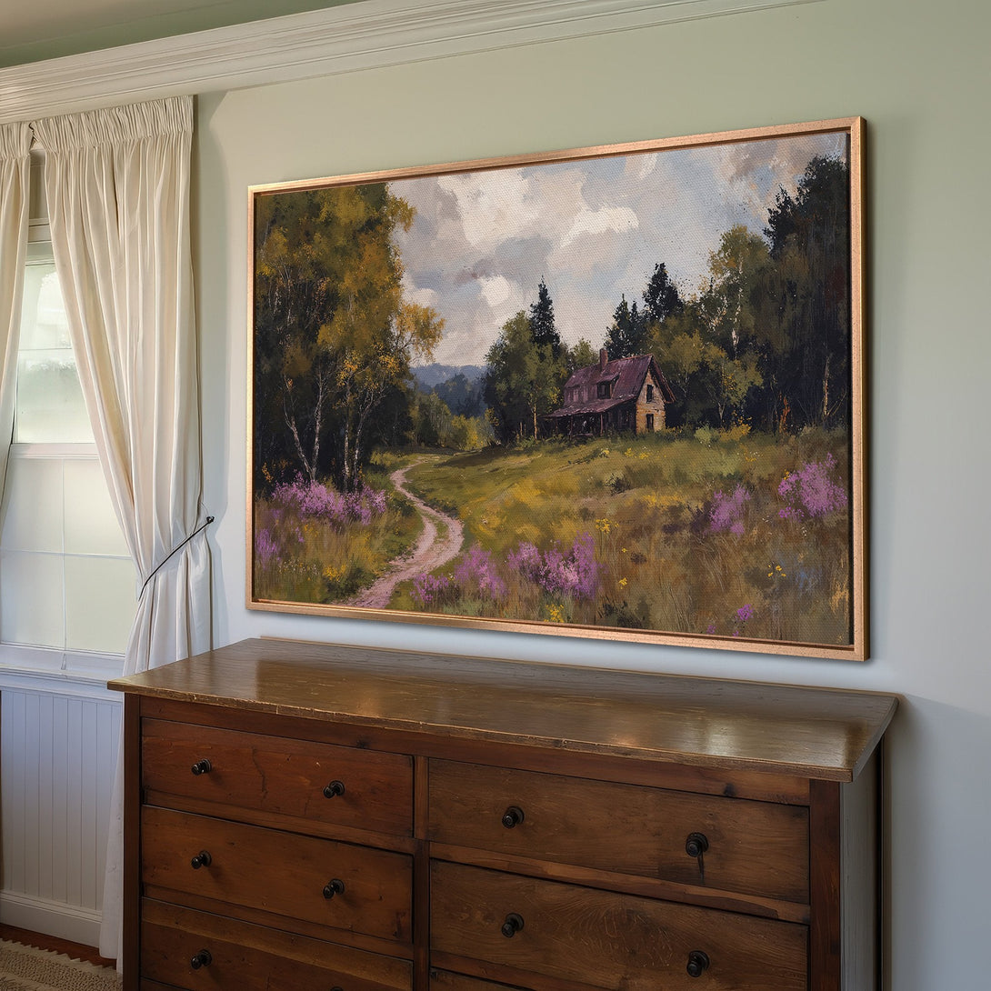 Framed Wall Art: Landscape painting of a house in a field, warm earth tones with pops of purple. Perfect for adding a touch of nature to your home.