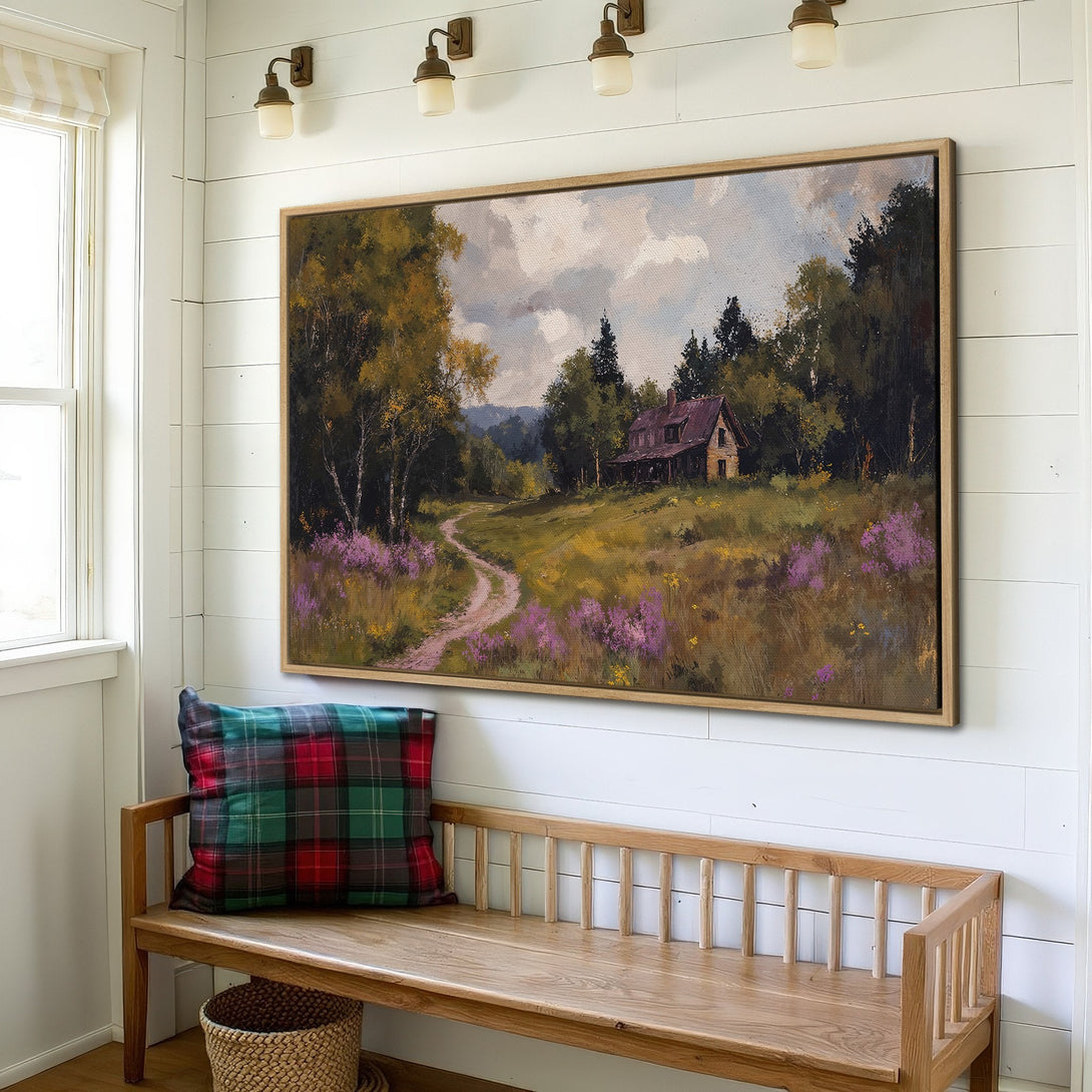 Framed Wall Art: Rustic landscape painting with a cabin, path, and colorful wildflowers. Earthy tones of green, brown, and purple add warmth to any space.