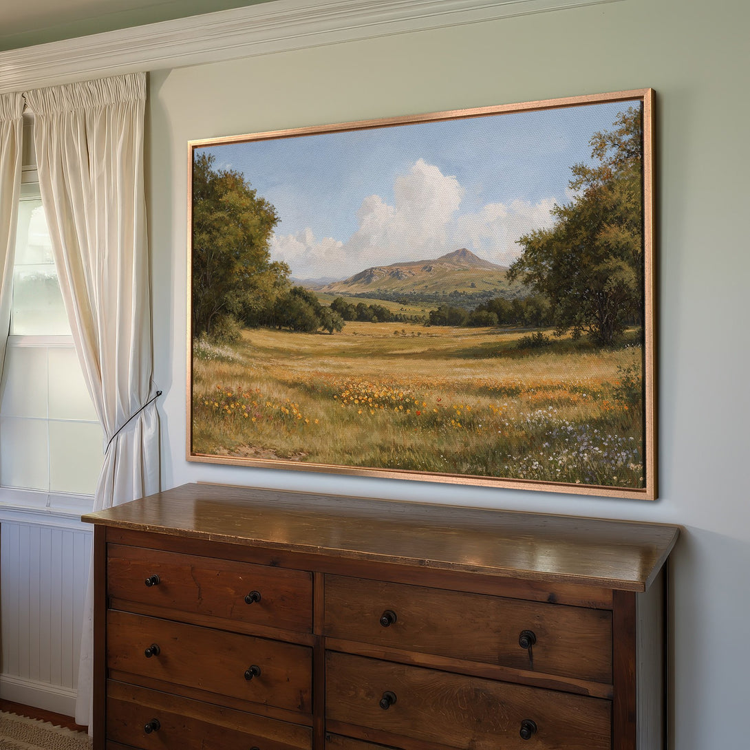 Framed Wall Art: Landscape Canvas Print with a serene meadow scene in warm earth tones and blues, perfect for adding a touch of nature to your home.
