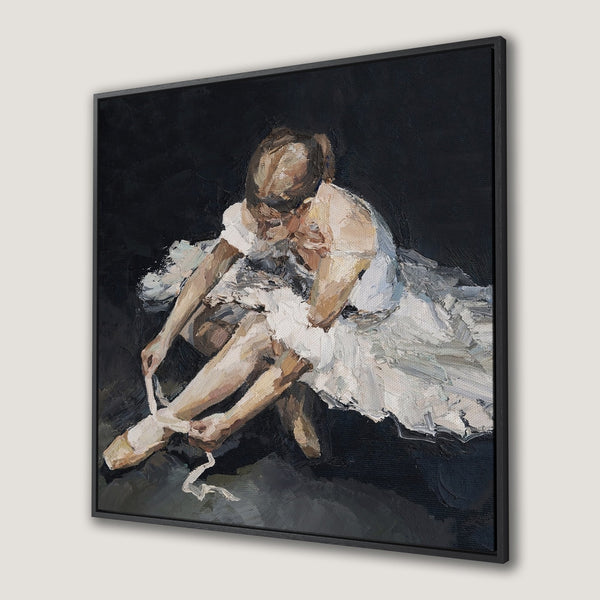 Framed Wall Art of a ballerina in a painterly style. Features a dark, moody palette with white, beige, and black hues. Perfect for elegant home decor.