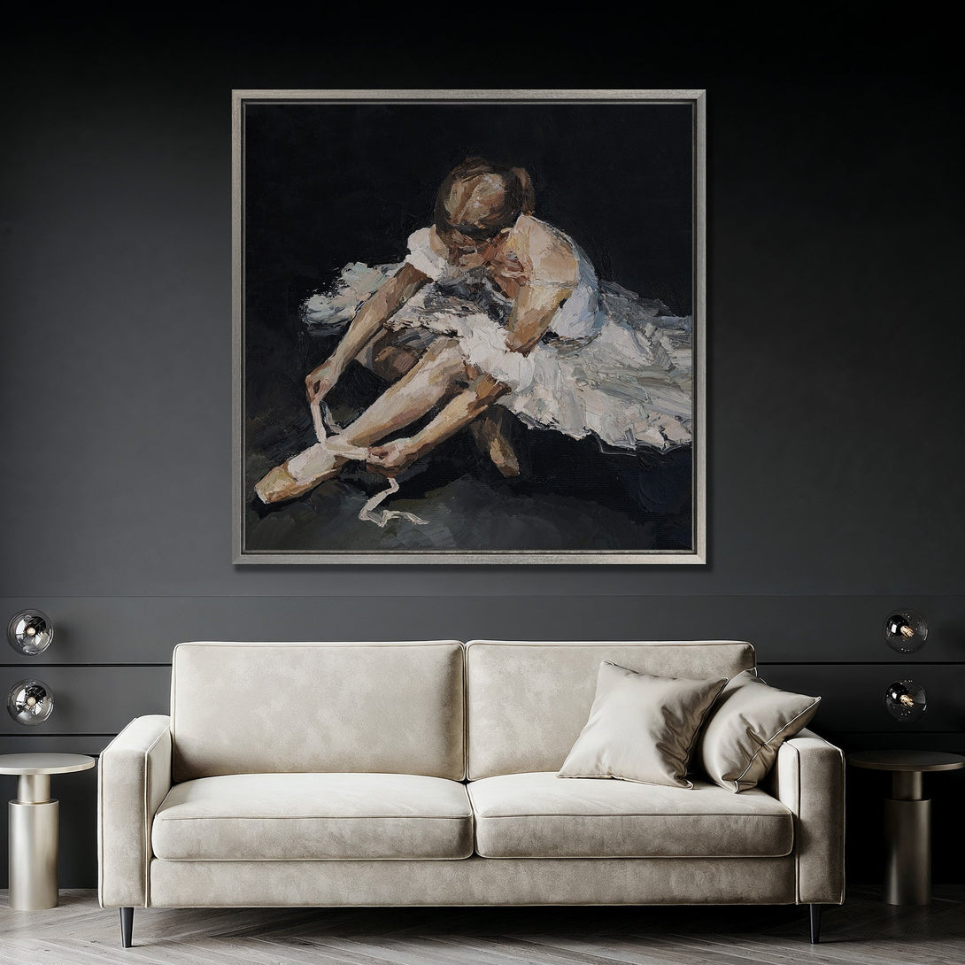 Framed Wall Art of a ballerina in a dark, moody style with a neutral color palette. Perfect for adding elegance to any space.