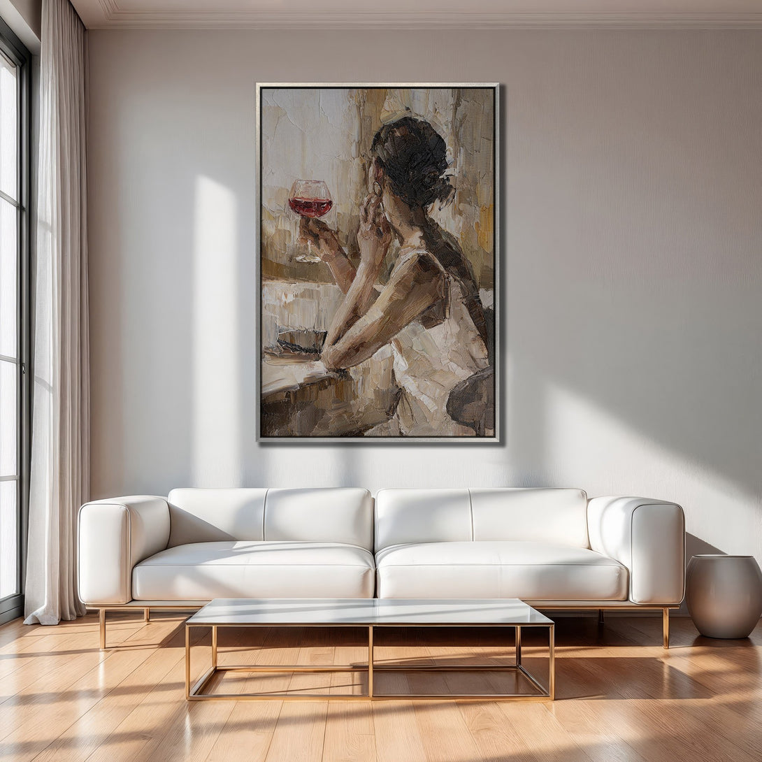 Framed Wall Art: Impressionist painting of woman with wine, warm neutral tones. Stylish living room decor, perfect for any space.