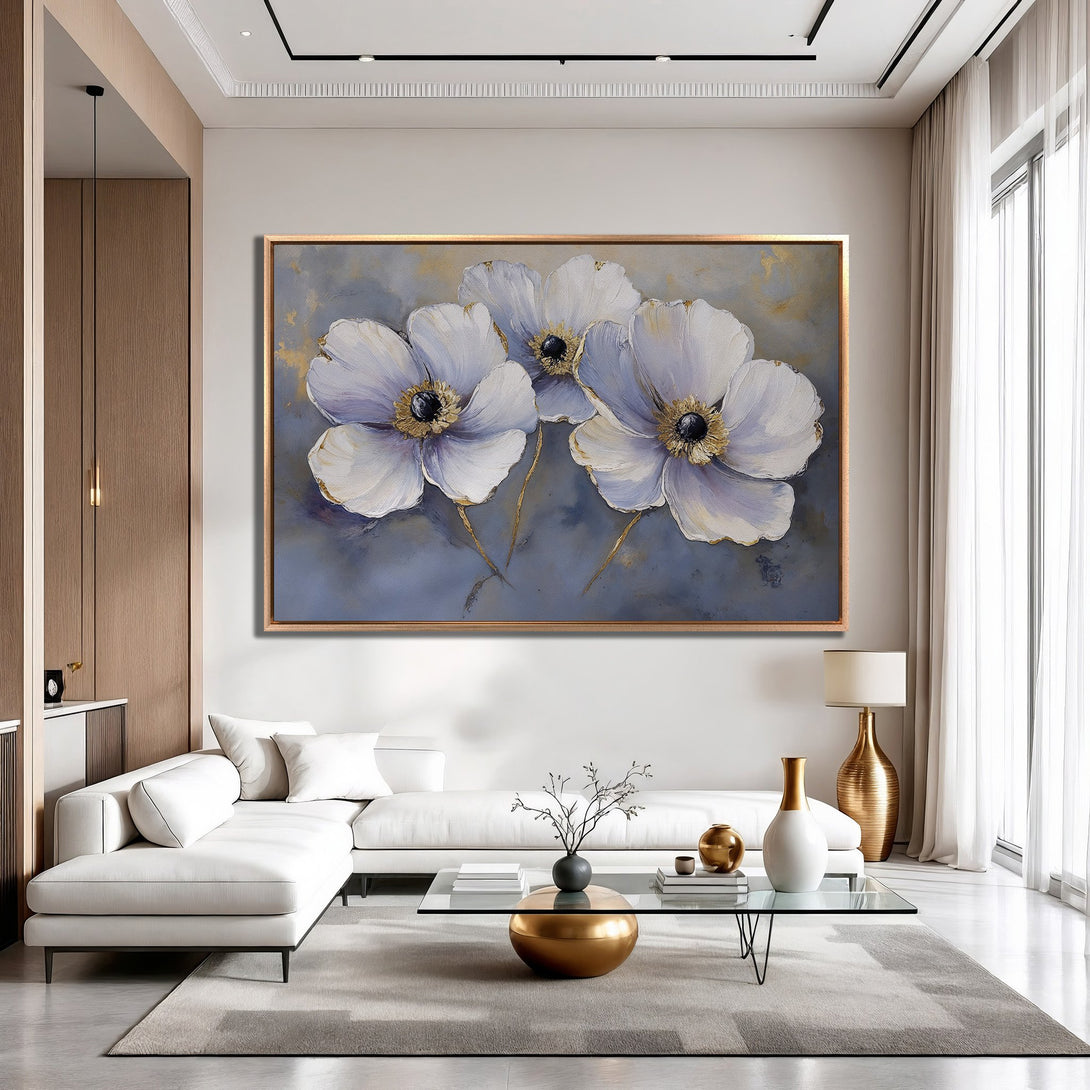 Framed Wall Art: Elegant floral painting in a modern interior. Features white and purple flowers with gold accents on a muted blue background. Perfect home decor.
