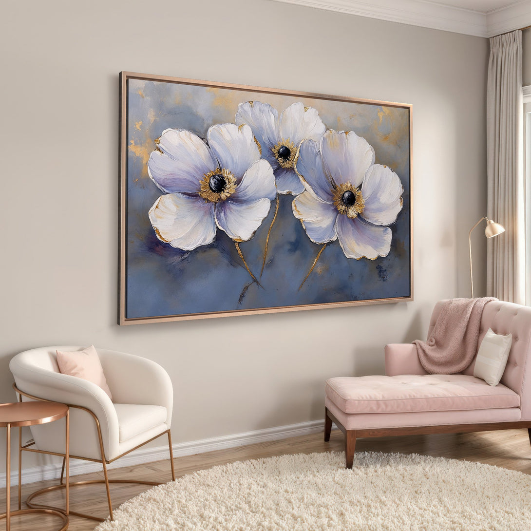 Framed Wall Art: Elegant floral canvas print in a modern style, featuring white and lavender flowers with gold accents, displayed in a serene interior with a pink color palette.