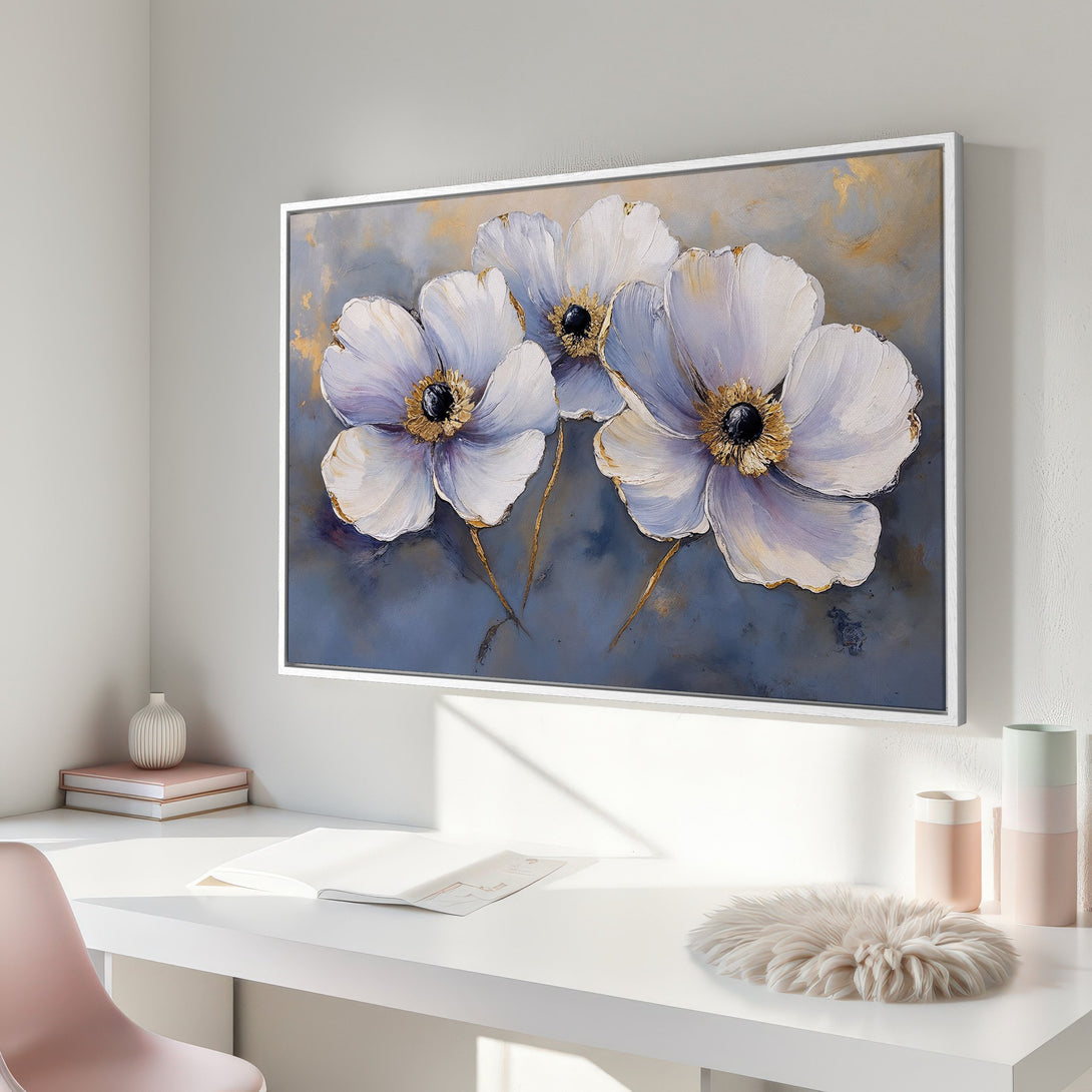 Framed Wall Art featuring elegant white flower painting with gold accents. Soft blue and neutral color palette. Perfect for modern home decor.