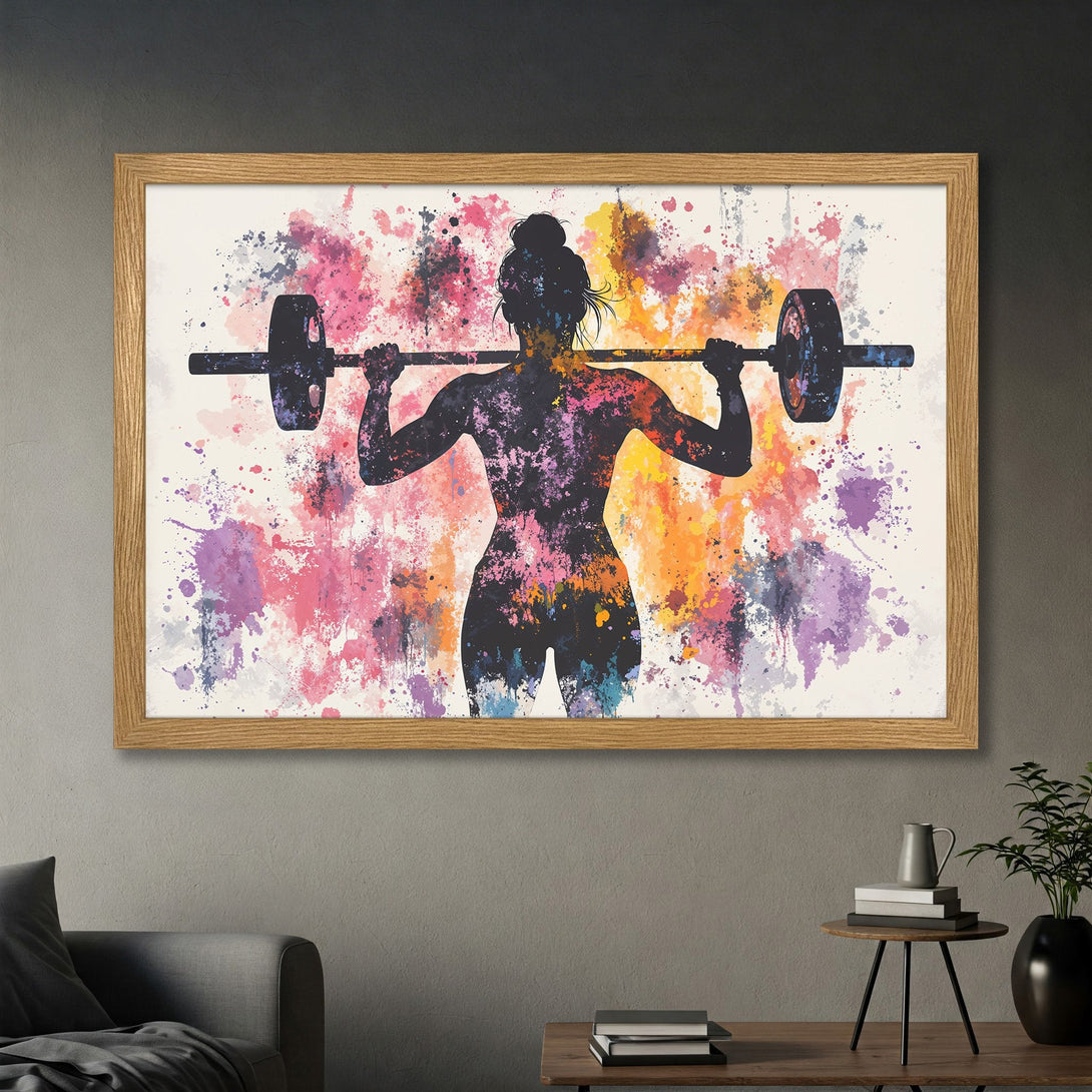 Framed Poster featuring a weightlifting woman in silhouette with colorful watercolor splashes. Perfect fitness decor!