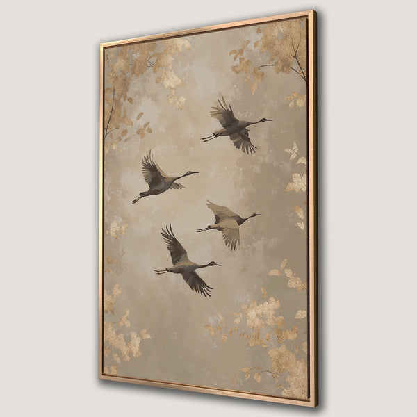 Framed Wall Art featuring cranes in flight. Elegant, neutral tones with gold leaf accents. Perfect for adding a touch of nature and sophistication to your space.