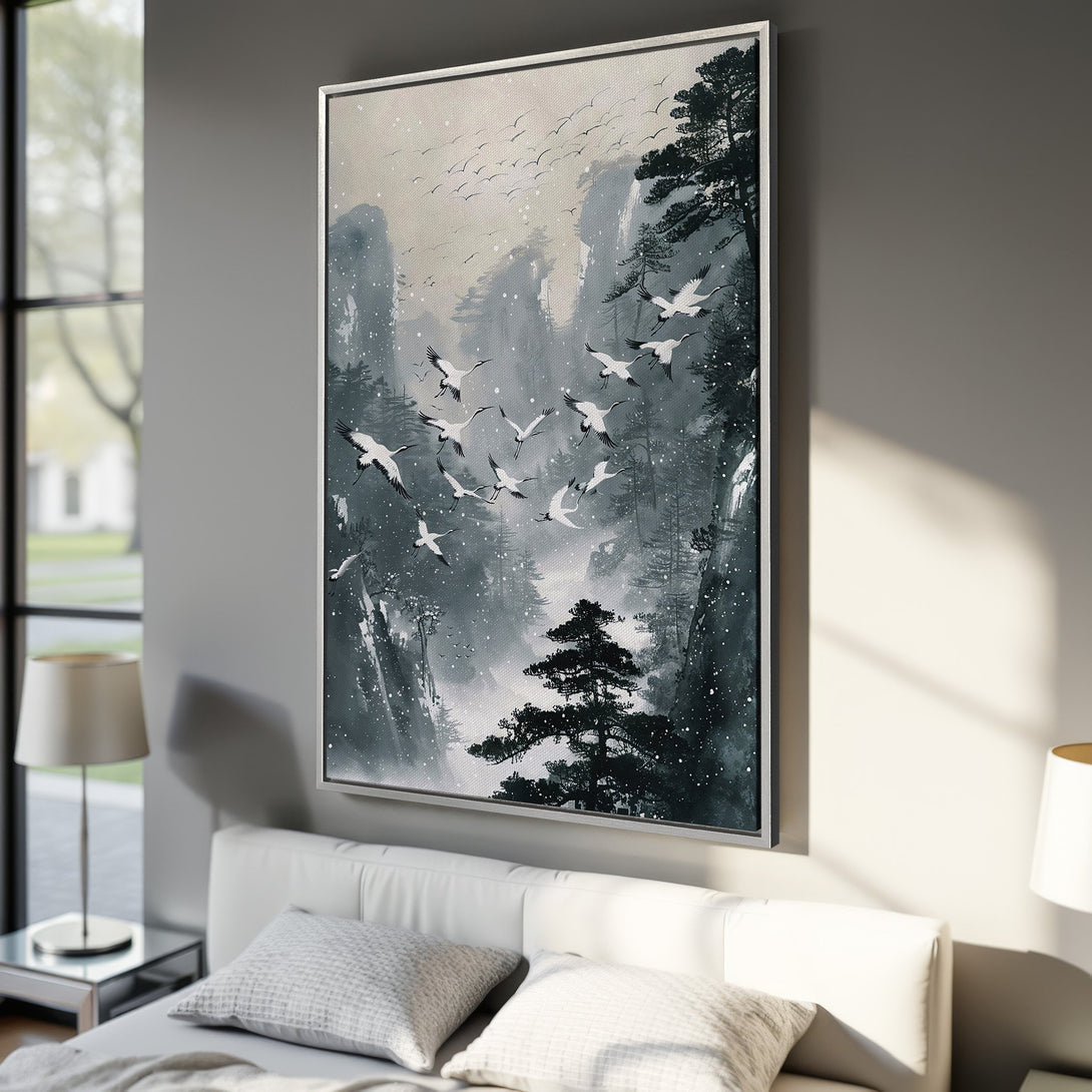 Framed Wall Art: Serene landscape Canvas Print with flying cranes, in a muted teal and gray palette. Perfect for a calming bedroom aesthetic.