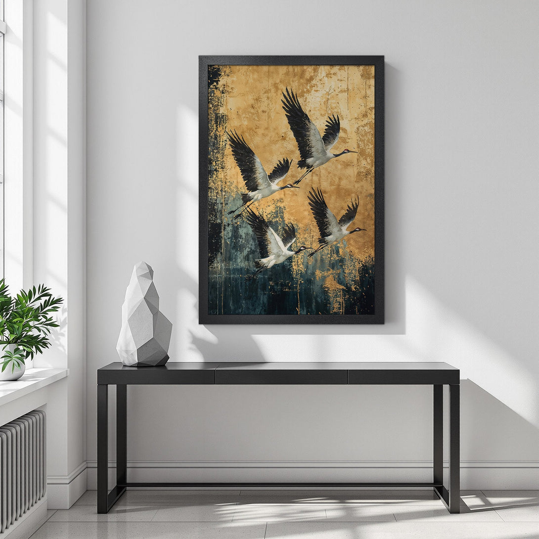 Framed Poster featuring flying cranes. Artistic style with gold, blue, and white color palette. Elevate your space with this stunning wall art.