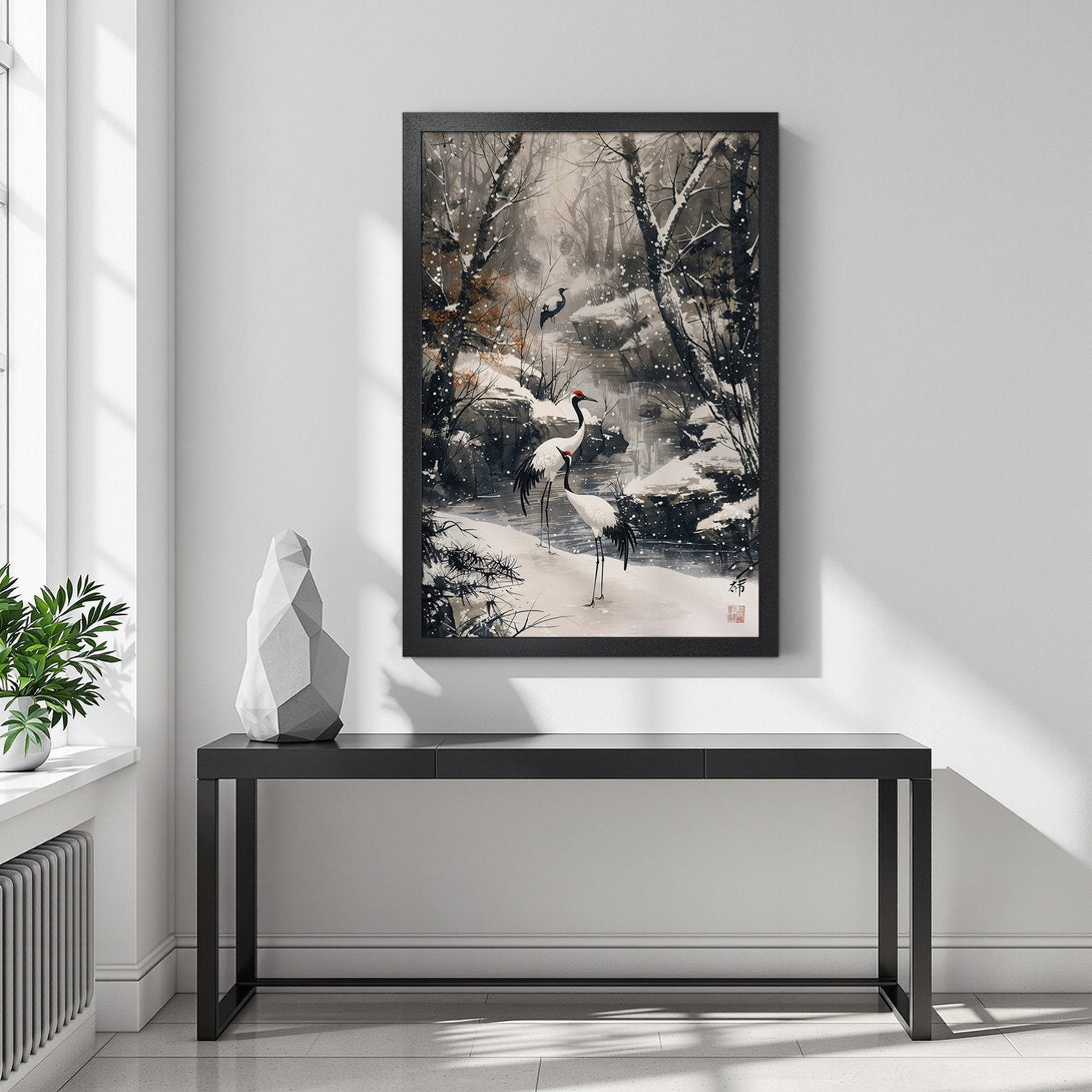 Framed Poster featuring Japanese cranes in a snowy forest scene, neutral color palette, perfect for minimalist decor.
