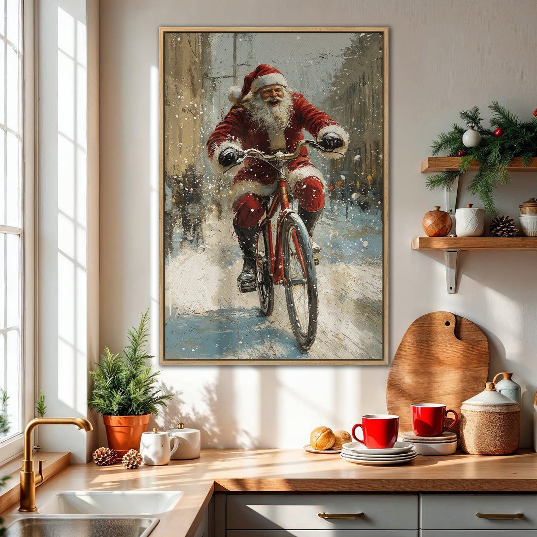 Framed Wall Art: Santa Claus riding a bicycle in a snowy scene. Festive artwork with a red, white, and blue color palette, perfect for Christmas decor.