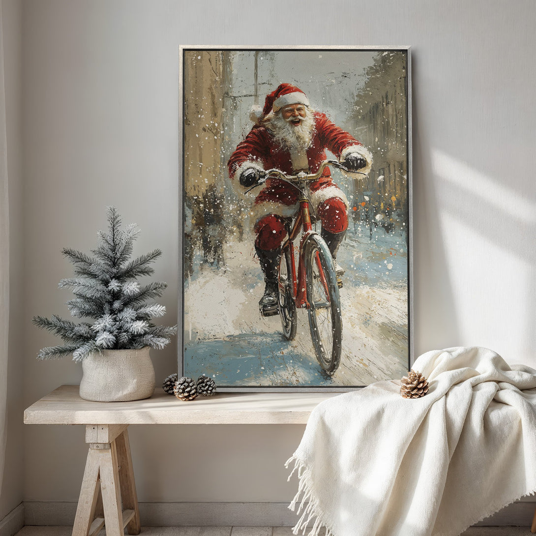 Framed Wall Art: Santa Claus on a bike in a snowy scene. Impressionistic style with red, white, and blue color palette. Perfect Christmas decor.