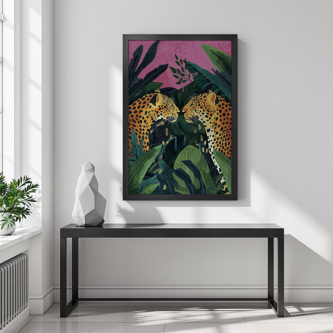 Framed Poster featuring two leopards in a jungle scene. Tropical style with green, pink, and gold color palette. Add a touch of wild to your decor!