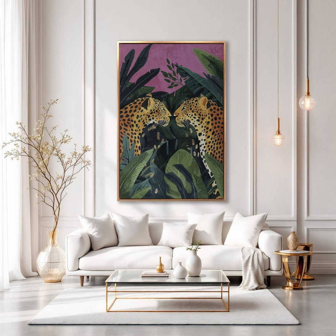 Framed Wall Art featuring two leopards in a jungle scene. Earthy tones of green, brown, and gold with a pop of pink. Perfect for modern decor.