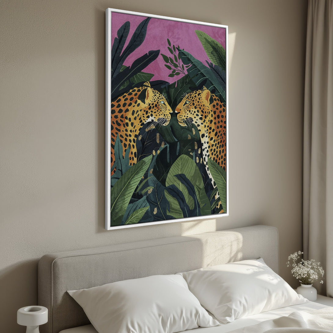Framed Wall Art featuring a vibrant jungle scene with two leopards. Tropical style, rich greens, yellows, and pinks. Perfect for adding a statement piece.