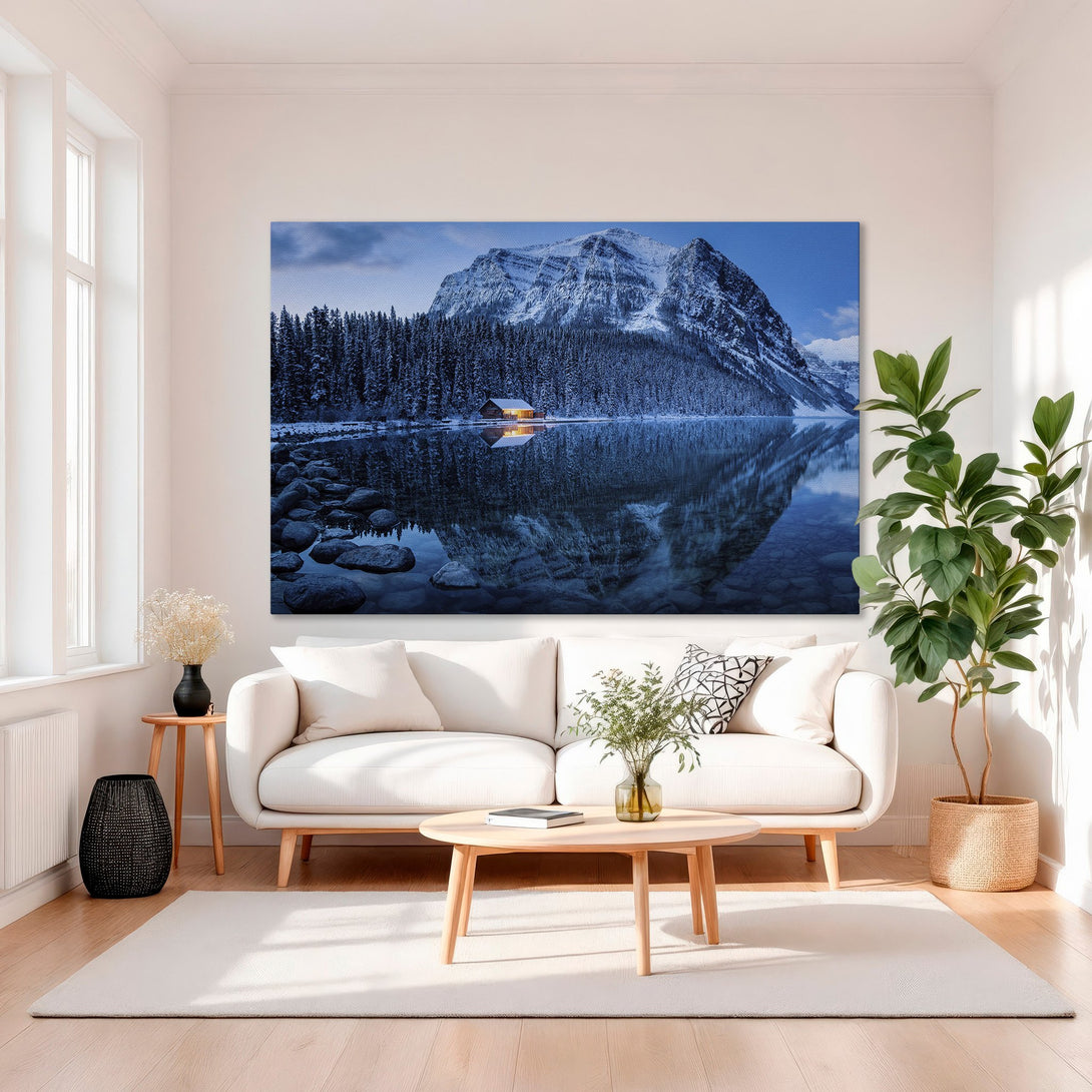 Framed Wall Art: Serene mountain lake landscape Canvas Print in cool blue tones, creating a tranquil atmosphere for your living room.