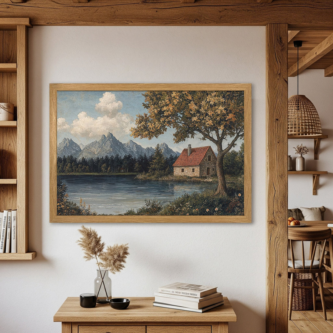 Framed Poster of a serene landscape painting with a cabin, mountains, and lake. Earth tones create a cozy, rustic aesthetic.
