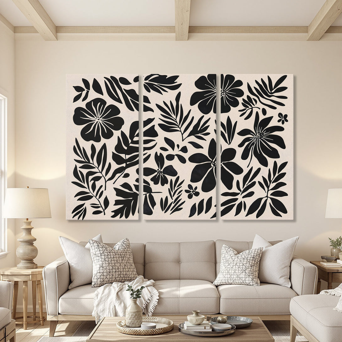 Canvas Print featuring a modern floral design in black and cream, perfect for adding a touch of elegance to any living room.