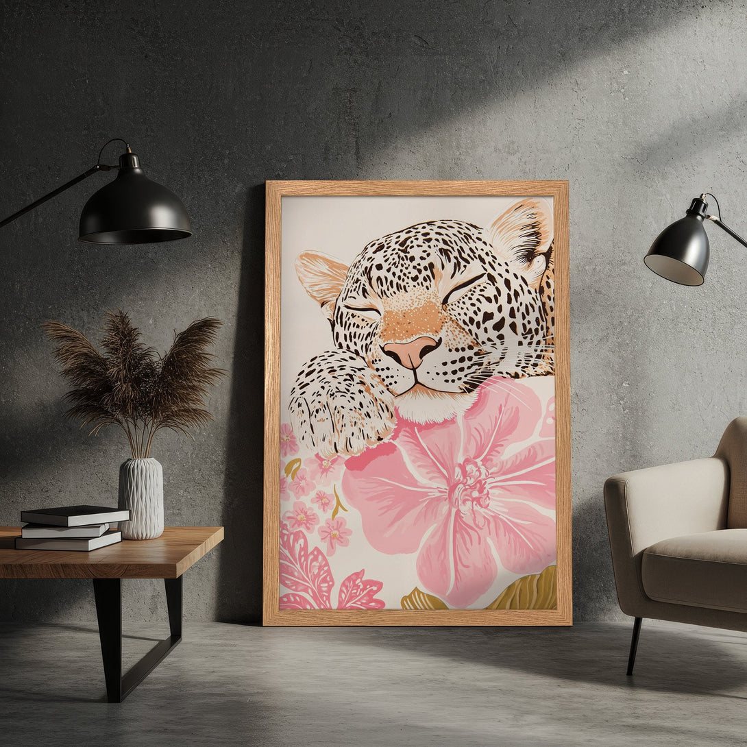 Framed Poster featuring a sleeping leopard with pink floral accents. Modern art style with a neutral and pink color palette.