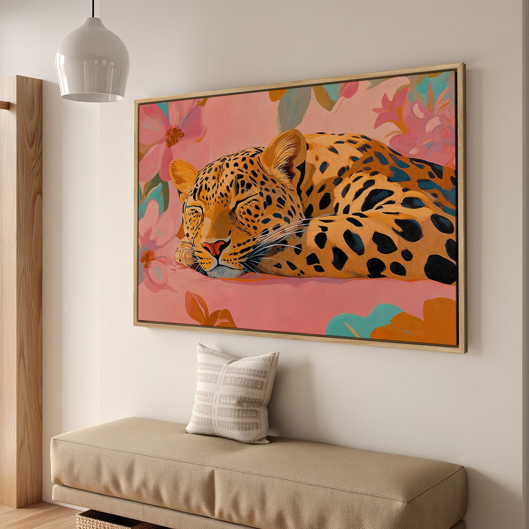 Framed Wall Art: Sleeping leopard canvas print in warm tones. Modern art with pink, orange, and teal accents, perfect for adding a touch of nature to your home.