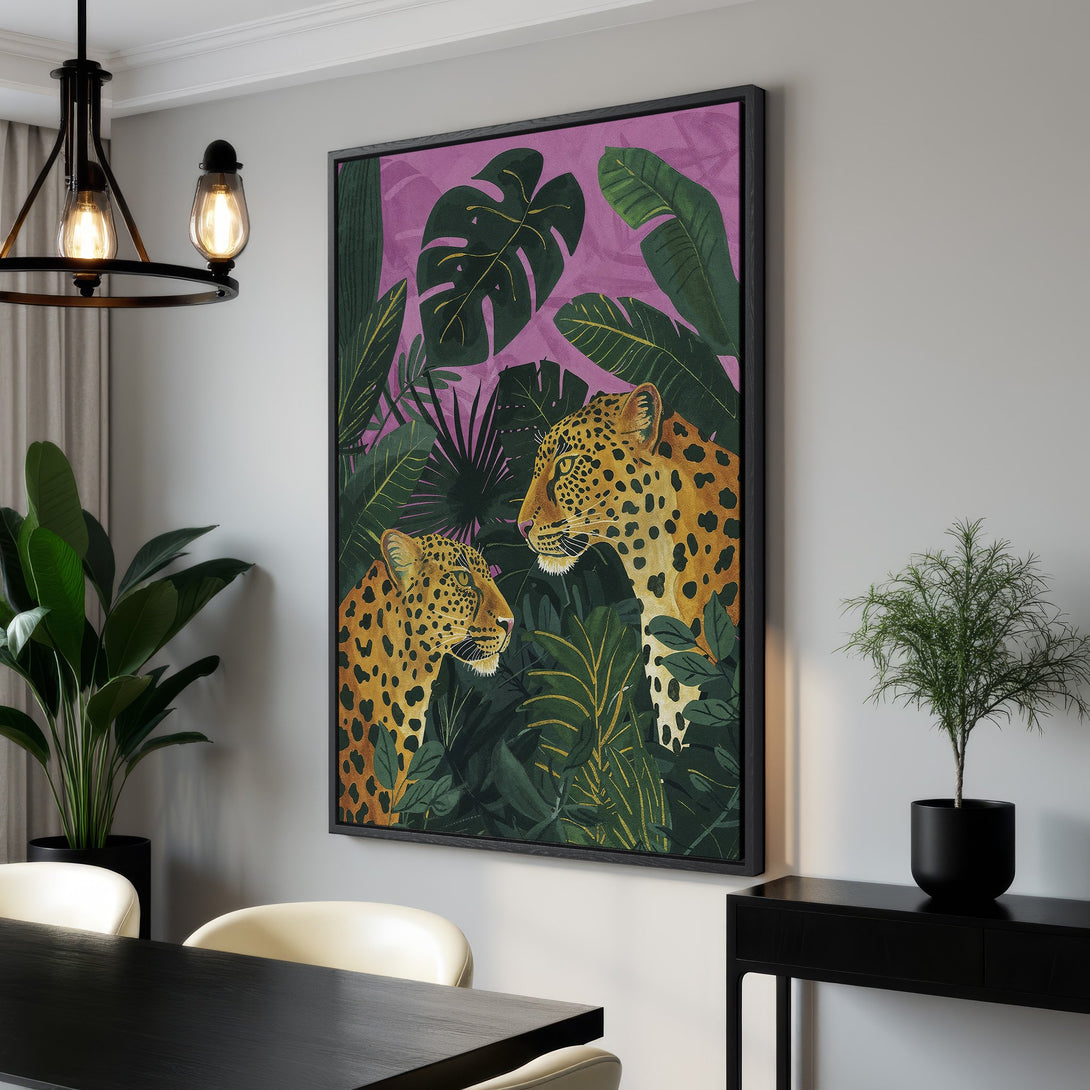Framed Wall Art featuring a vibrant jungle scene with leopards. Tropical style, rich green, purple, and gold color palette. Perfect for adding a bold touch to any room.