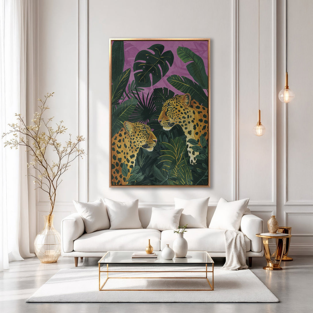 Framed Wall Art: Leopard Canvas Print in a modern interior. Featuring a jungle scene with leopards, lush greens, and a purple backdrop. Enhance your decor!