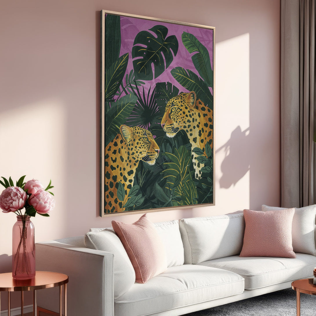 Framed Wall Art featuring a vibrant leopard illustration in a lush jungle setting. Earthy and pink tones create a stylish, modern interior.
