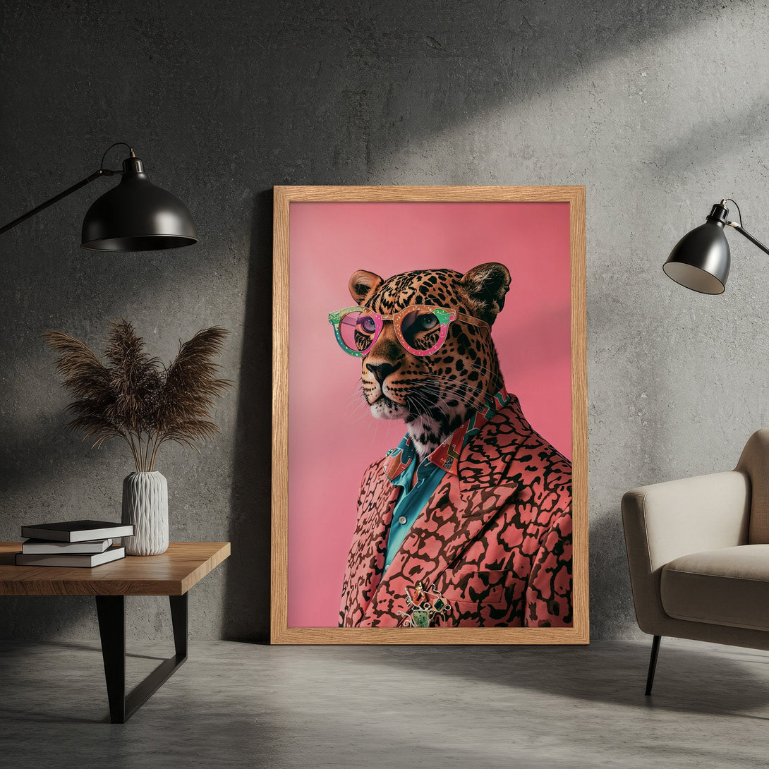 Framed Poster featuring a stylish leopard in a pink and black patterned jacket, with a pink background. Modern art print.