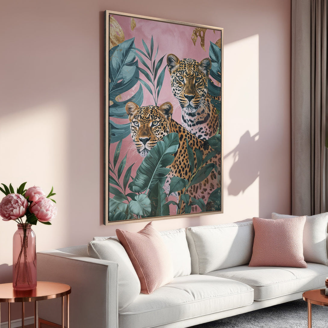 Framed Wall Art featuring leopards in a tropical setting. Stylish pink and green color palette. Elevate your living room with this stunning canvas print.