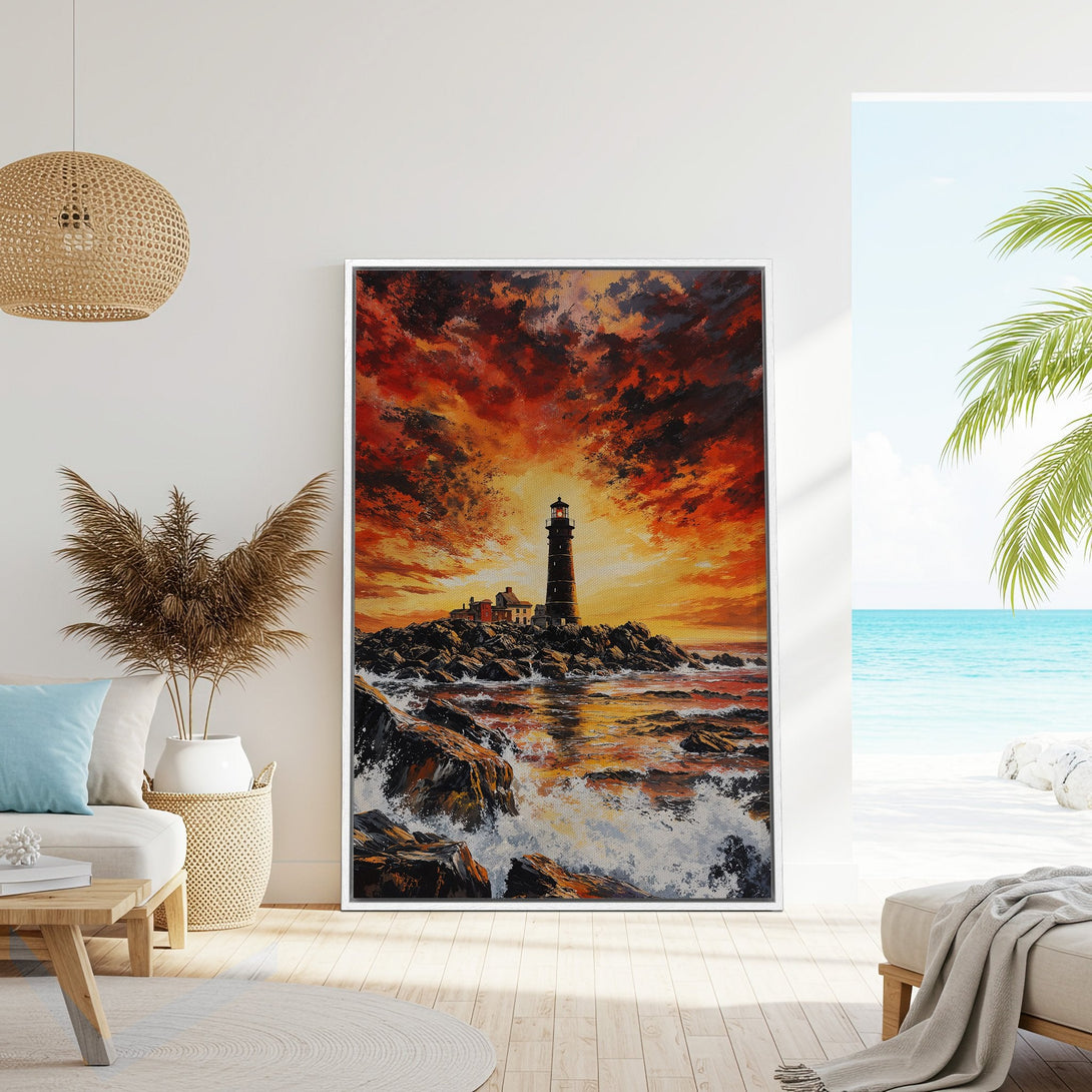 Framed Wall Art of a lighthouse painting with fiery sunset. Coastal decor in warm orange and black tones. Enhance your home with this stunning artwork.