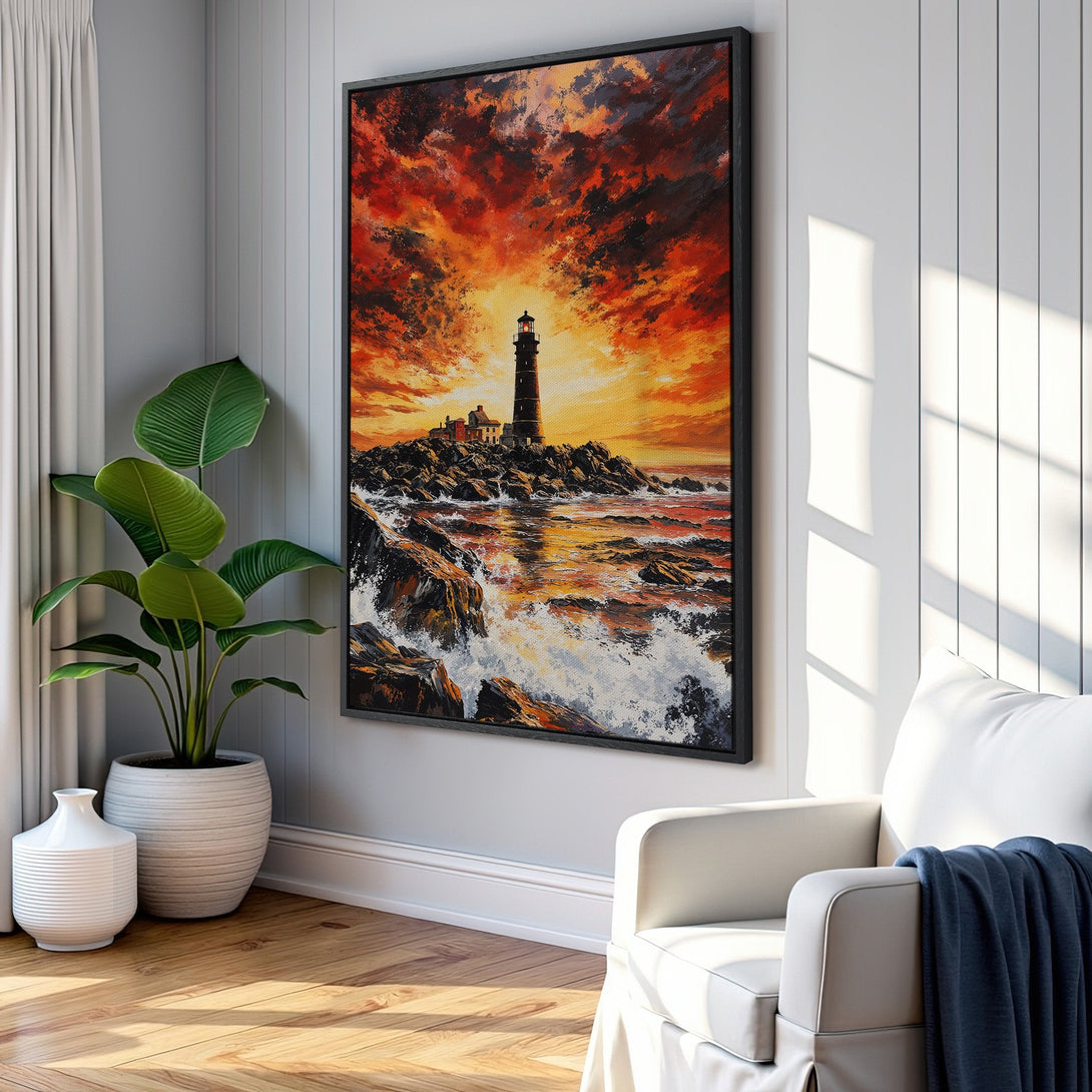 Framed Wall Art: Dramatic lighthouse painting with fiery orange and red sunset. Coastal art in a living room setting. Add warmth to your space!
