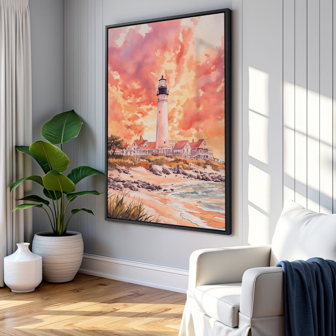 Framed Wall Art: Watercolor lighthouse print with warm sunset hues. Coastal decor in a living room setting. Add a touch of serenity to your space!