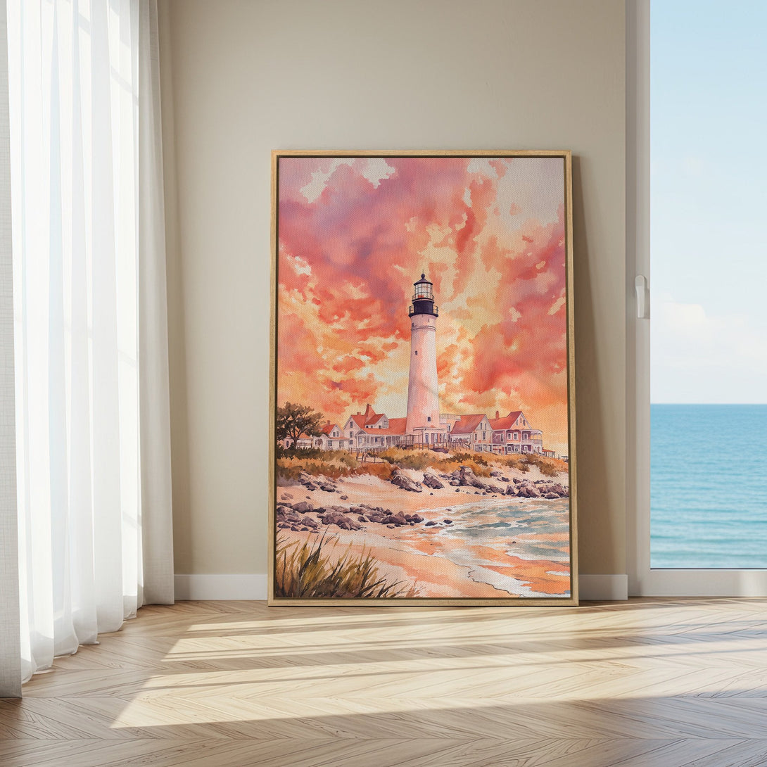 Framed Wall Art: Watercolor lighthouse print with warm sunset hues. Coastal decor in a cozy interior. Add a touch of serenity to your space!